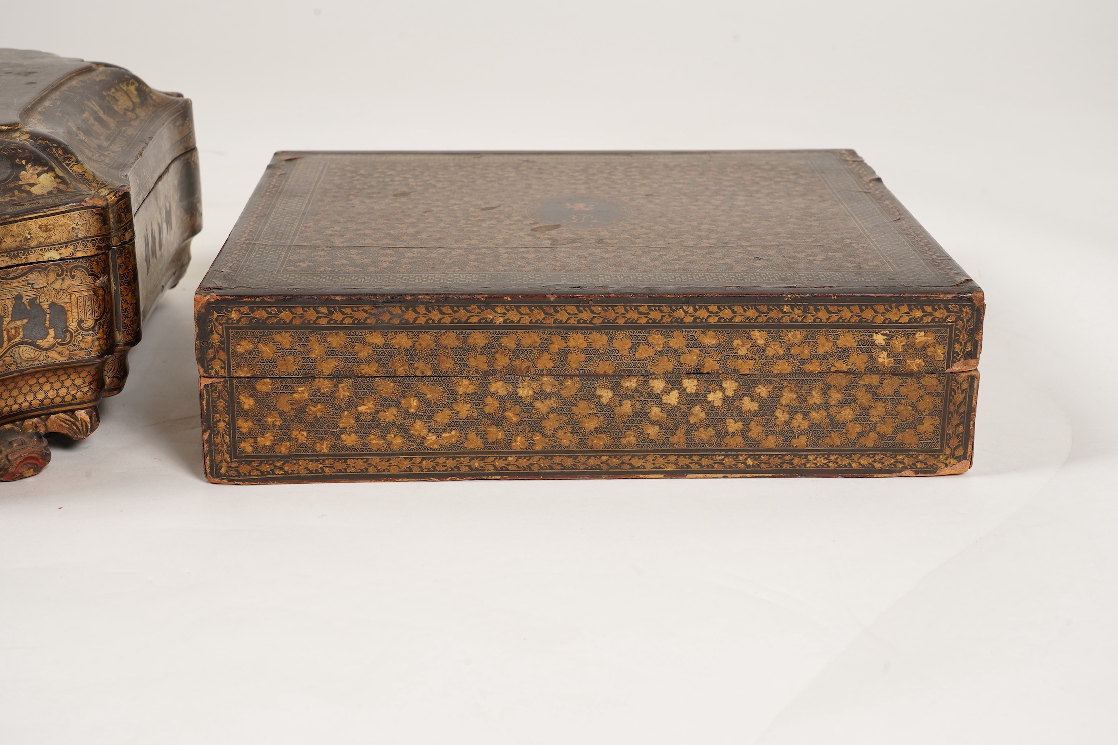 Two Chinese gilt decorated black lacquer games boxes, containing numerous mother-of-pearl counters, 19th century